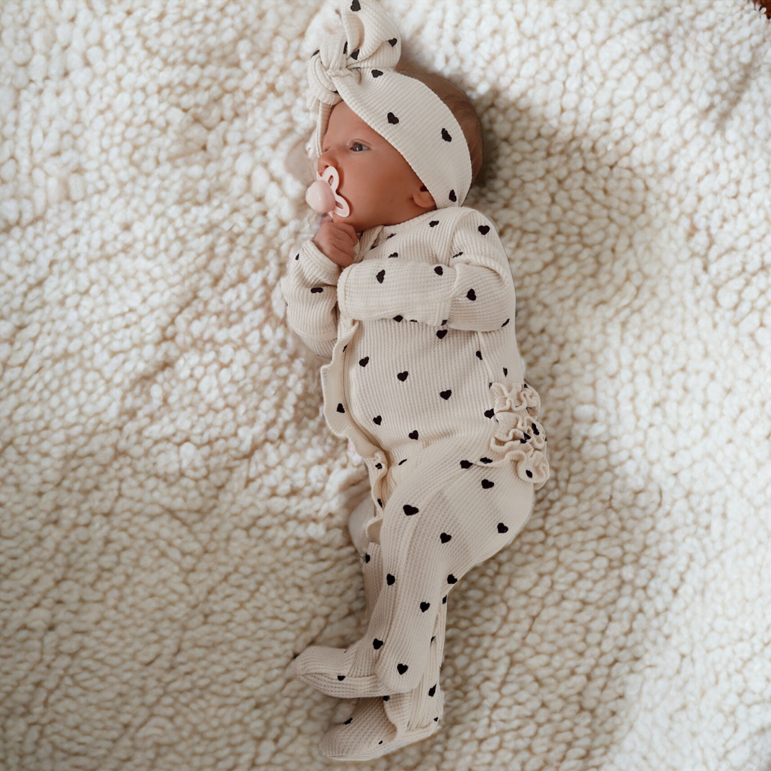 Organic Waffle Ruffle Zip Footie - Black Heart - Twinkle Twinkle Little One