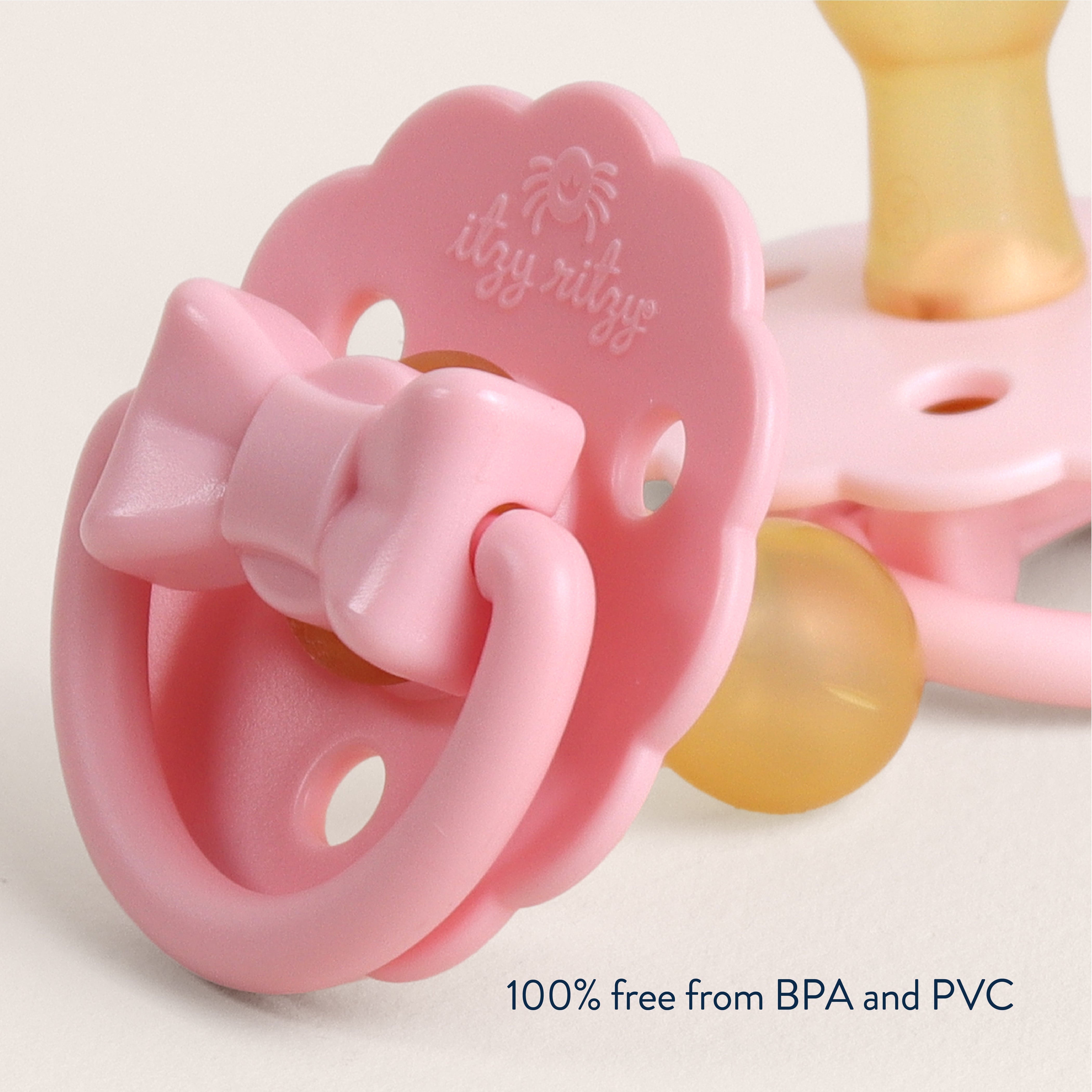 Itzy Ritzy Itzy Soother Natural Rubber Pacifier | Pink Bow