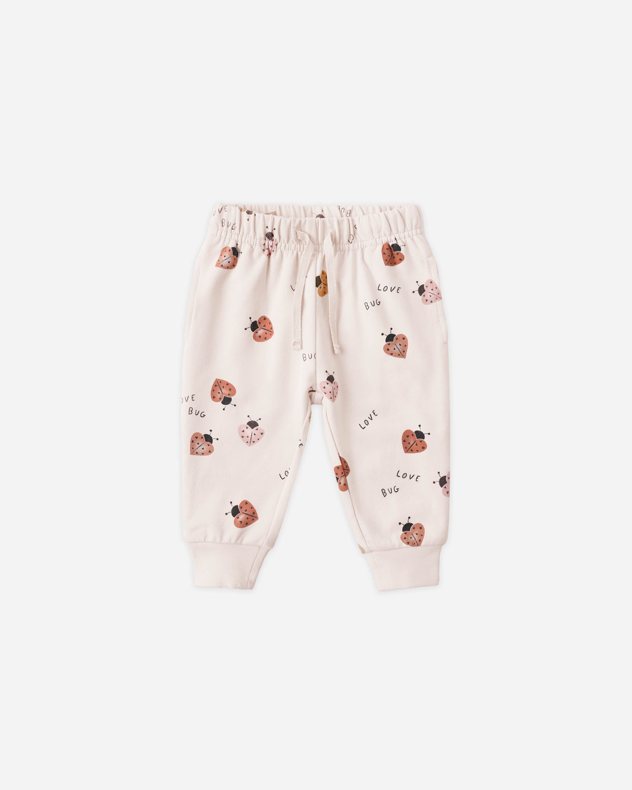 Baby pants with ladybug pattern on a white background
