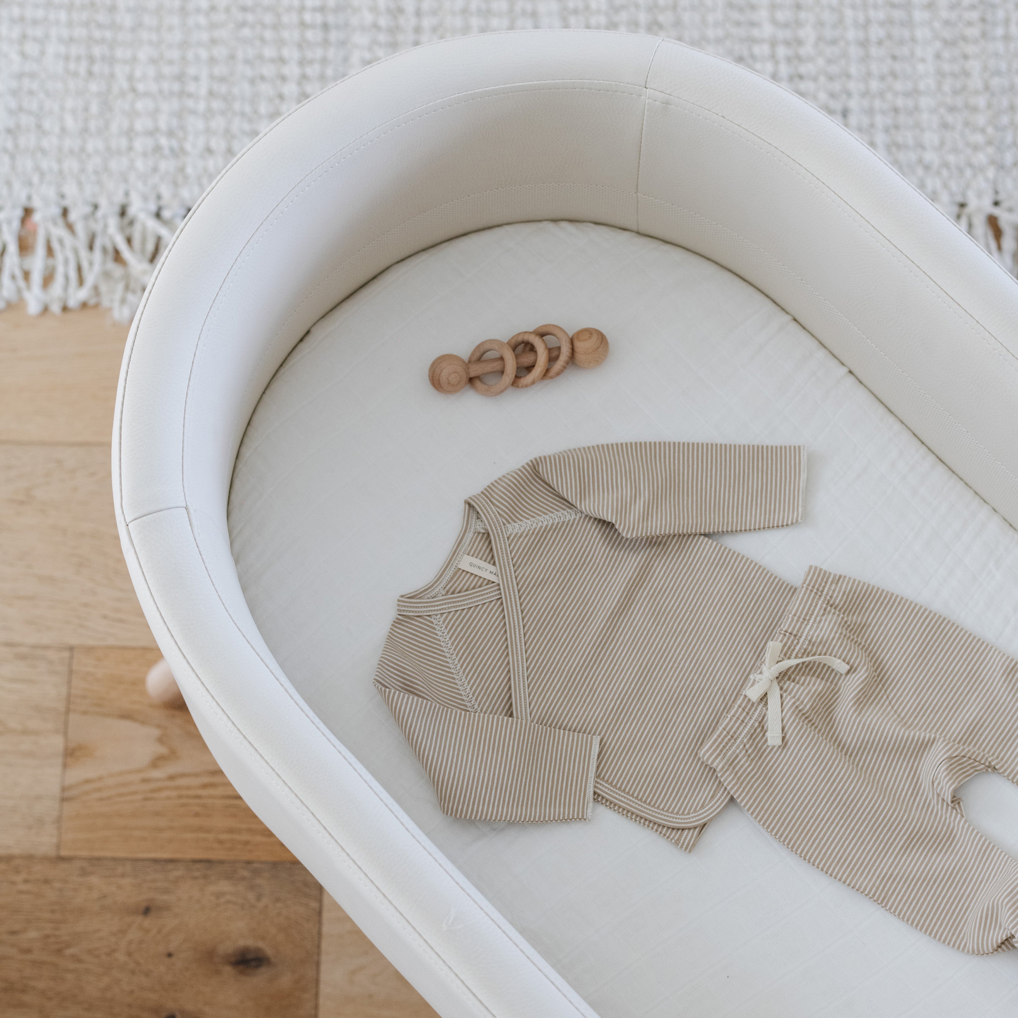 M26834GYLB,Babyletto,babyletto x GATHRE Capsule Bassinet in Ivory