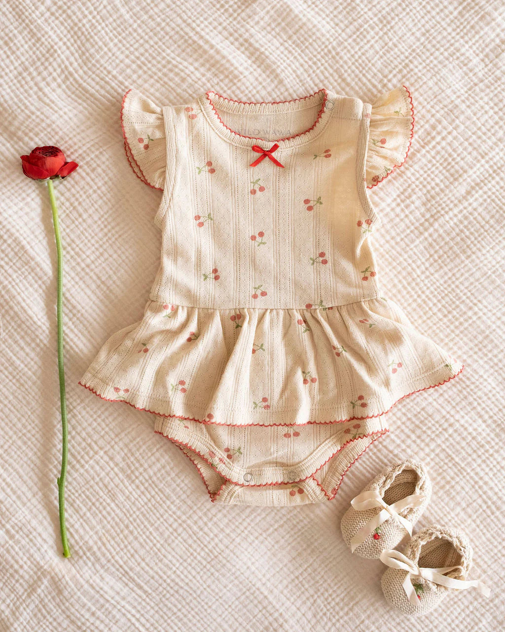 Pointelle Skirt Onesie in Cherries