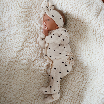 Organic Waffle Ruffle Zip Footie - Black Heart - Twinkle Twinkle Little One