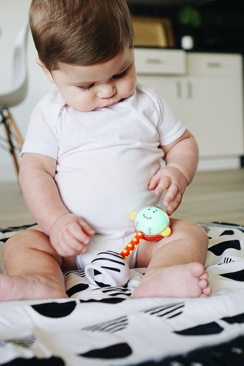 NogginStik Developmental Light-up Rattle