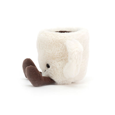 A plush novelty mug shaped like a white elephant sitting down, featuring a soft white faux-fur body, floppy ears, a small black embroidered eye, and brown corduroy feet, photographed on a clean white background.