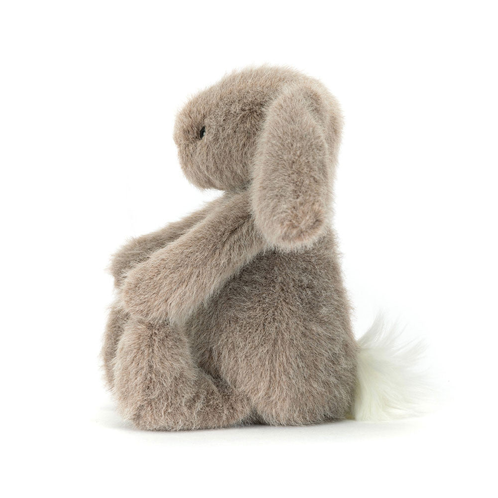 Plush bunny toy with a white background