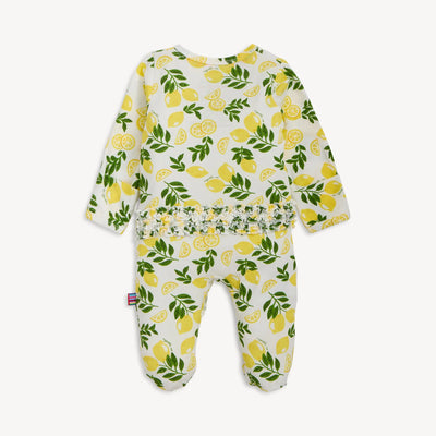 Baby onesie with lemon pattern on a white background