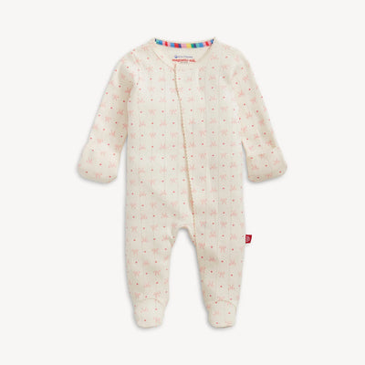 Baby onesie with a bow pattern on a white background