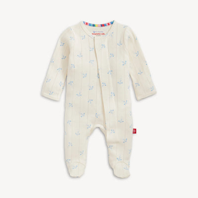 Baby onesie with airplane pattern on a white background