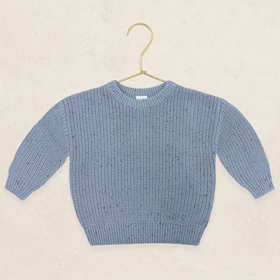 Cadet Sparkle chunky knit sweater on a gold hanger, cozy and warm.
