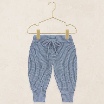 Cadet Sparkle knit chunky jogger pants on a gold hanger