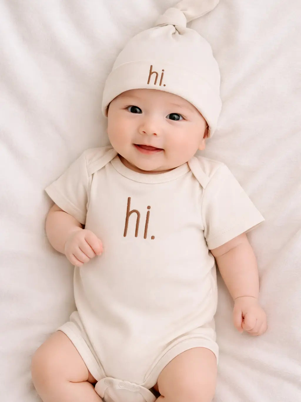 Hi. Embroidered Pecan Cotton Knit Onesie & Top Knot Hat