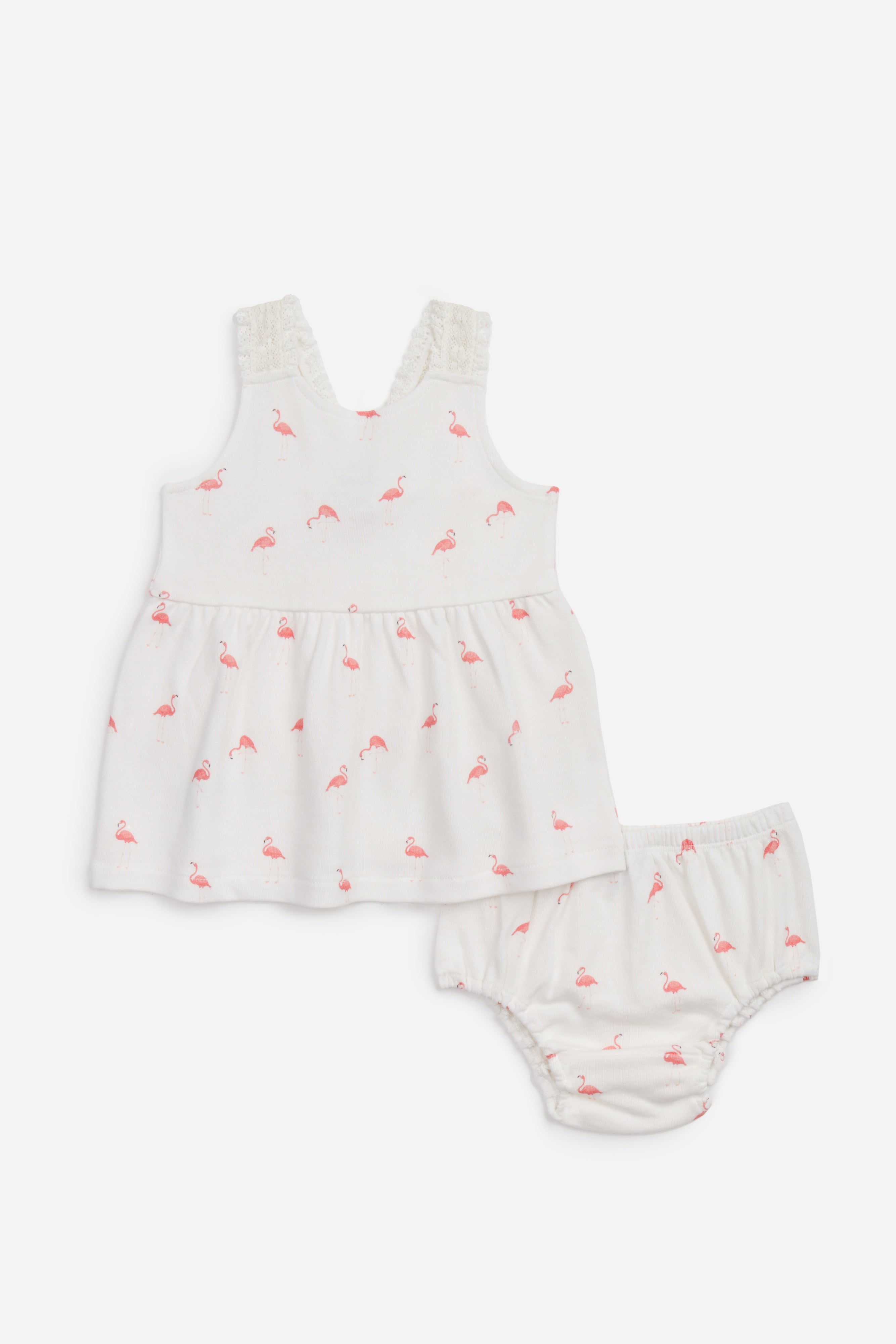 Baby dress and bloomers set with flamingo pattern on a white background