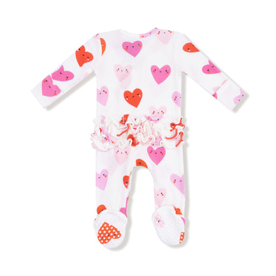 Baby onesie with heart pattern on a white background