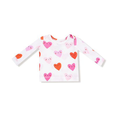 Children's long-sleeve shirt with heart patterns on a white background