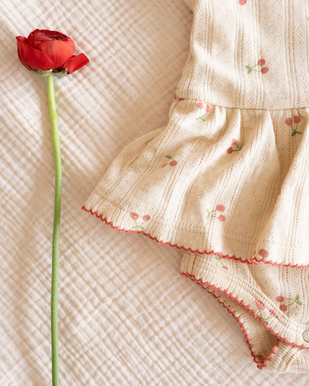 Pointelle Skirt Onesie in Cherries